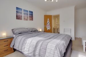 Bedroom One- click for photo gallery